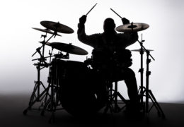 Siloutte of a male drummer in the studio